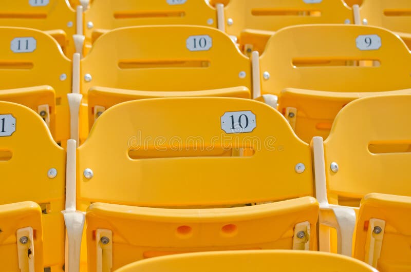 Yellow Stadium Seats stock photo. Image of group, audience 99722446