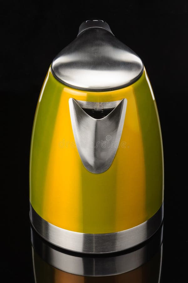 Yellow Stainless Steel Kettle on Black Mirror Background Stock Photo