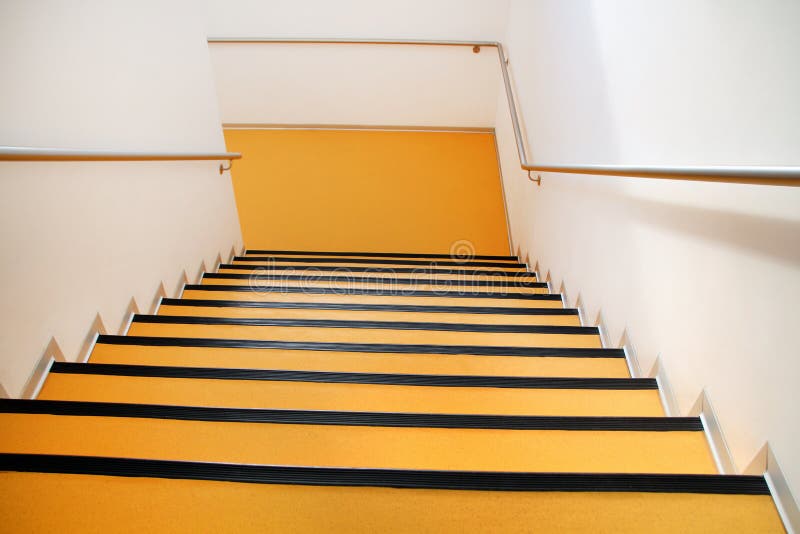 Yellow stairs on building stock photo. Image of motion 175659186