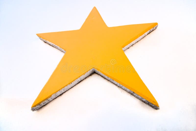 Yellow Star on a White Wall Stock Image Image of yellow, bright 105999807