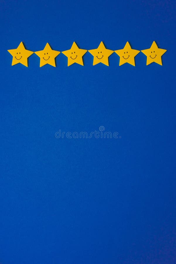 Yellow stars against the blue night sky. Application paper on the right. Copy space royalty free stock images Yellow stars against the blue night sky. Application paper on the right. Copy space royalty free stock images