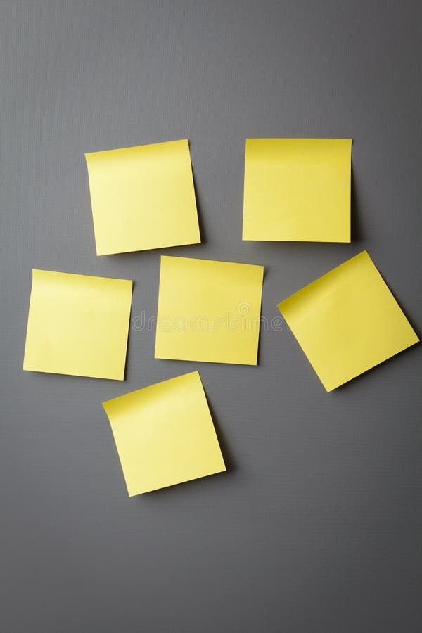 Yellow sticky notes on wall