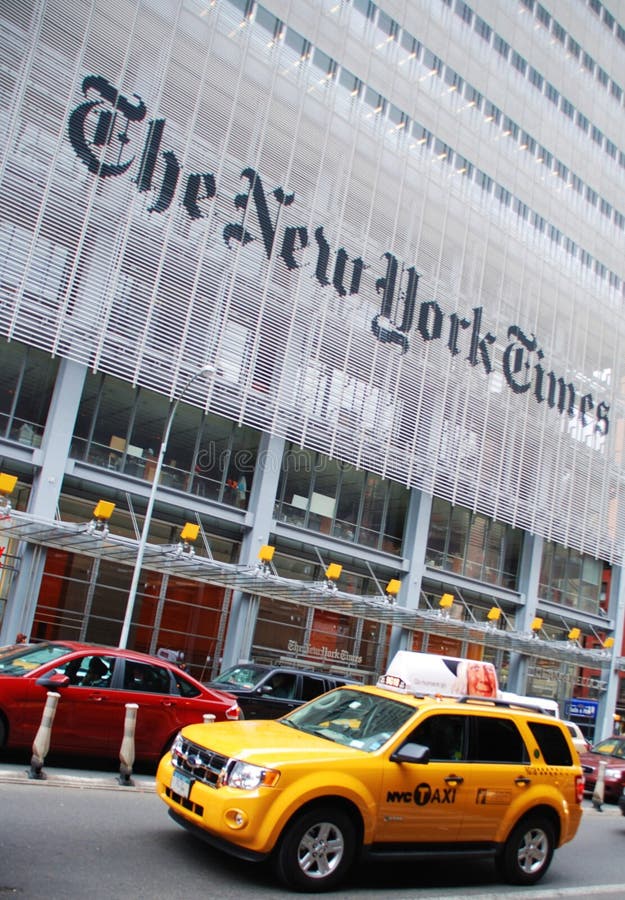 Yellow taxi outside New York Times building stock image Yellow taxi outside New York Times building stock image
