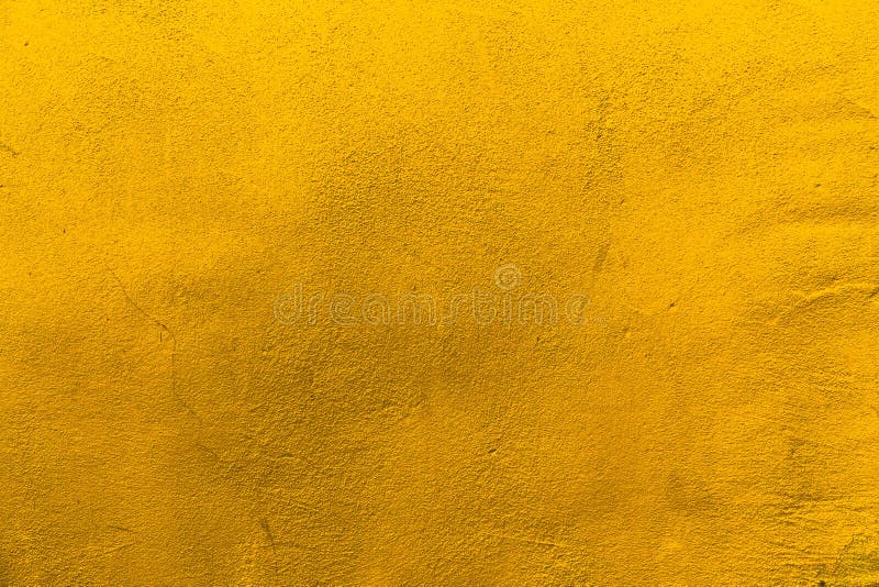 Yellow Toned Abstract Textured Background or Wallpaper Stock Image