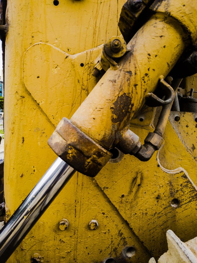 Yellow tractor detail stock image. Image of closeup 110494923