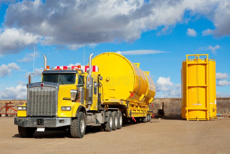 Yellow Transport With Oilfield Tanks Royalty Free Stock Image Image