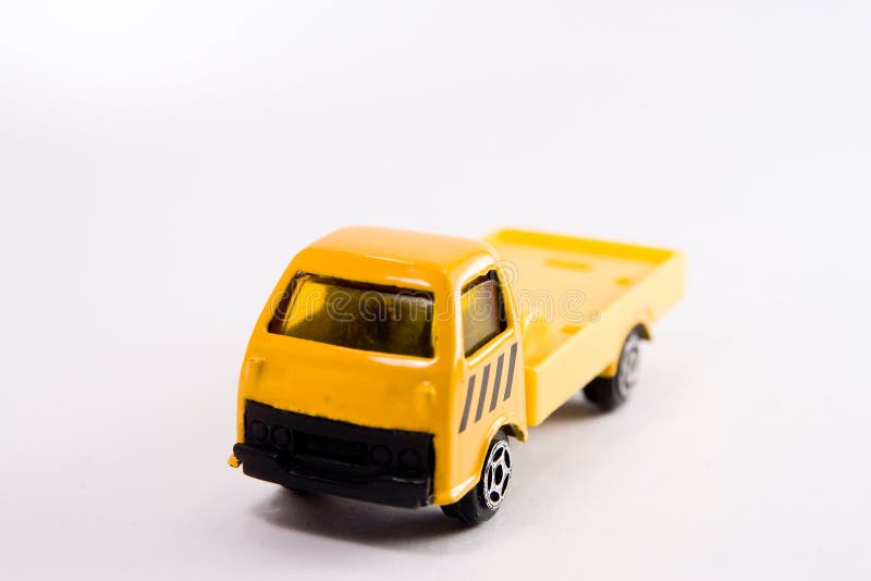 Yellow truck toy stock image. Image of truck, driver, driving 4382353