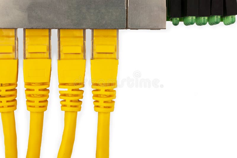 4 yellow UTP patch cords connected in ethernet switch, with top view. royalty free stock image