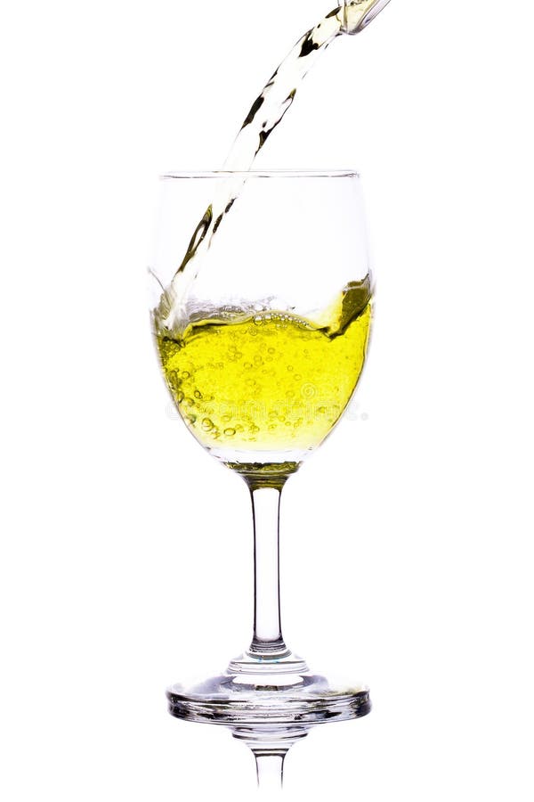 Yellow Water in Wine Glass. Isolated on a White Background Stock Image