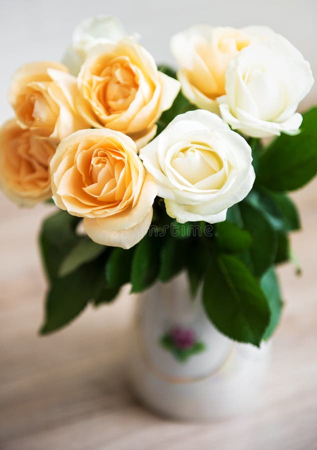 Yellow and white roses stock image. Image of space, beautiful 147601063