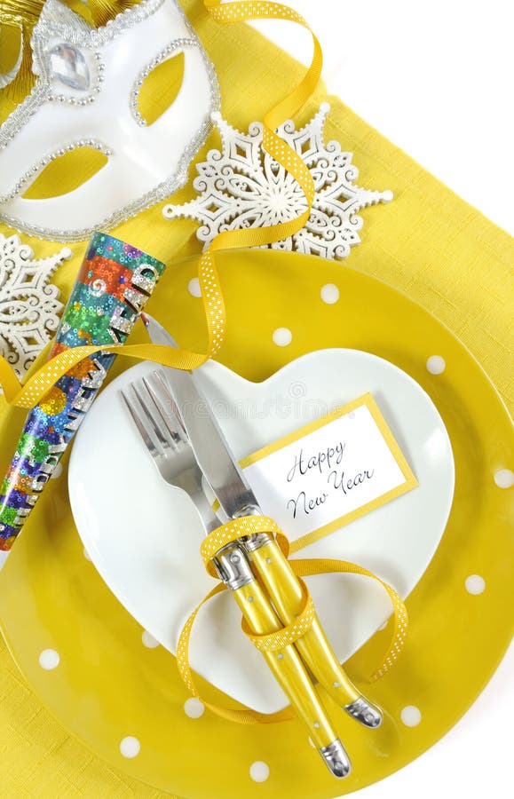 Yellow and white theme Happy New Year table setting
