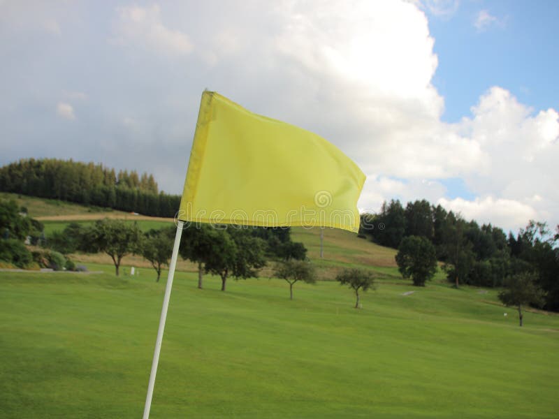 Yellow golf flag stock image. Image of play, sand, cloud 25668409