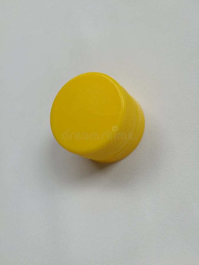 Yellow bottle cap isolated stock image. Image of plastic 100429023