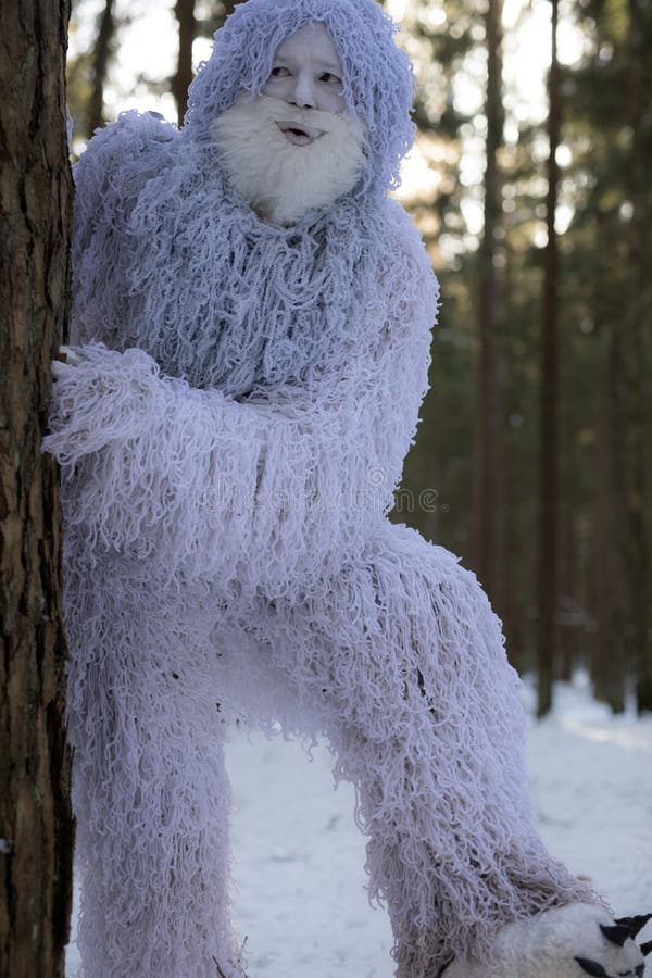 Yeti fairy tale character in winter forest. Outdoor fantasy photo. Yeti fairy tale character in winter forest. Outdoor fantasy photo