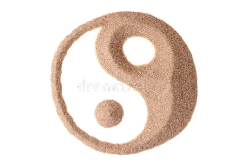 Universal symbol yin yang sculptured in sand. Universal symbol yin yang sculptured in sand