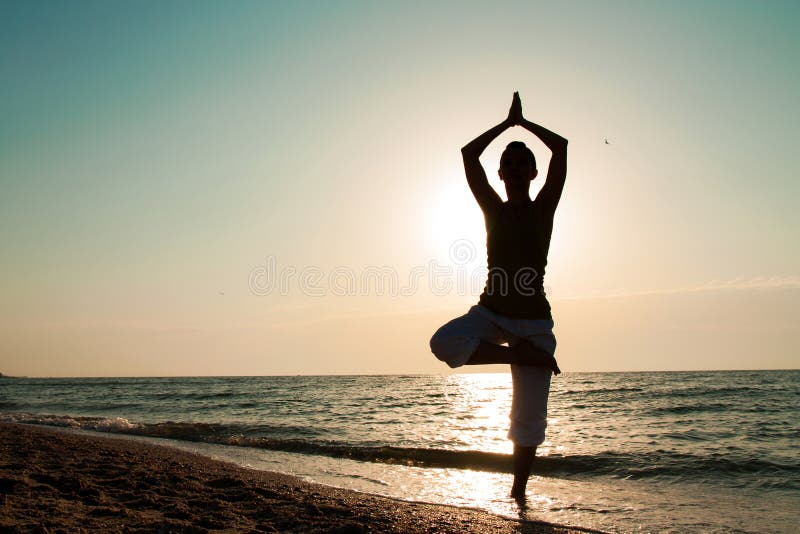 Yoga On The Beach At Sunrise. Stock Photo - Image of healthcare ...
