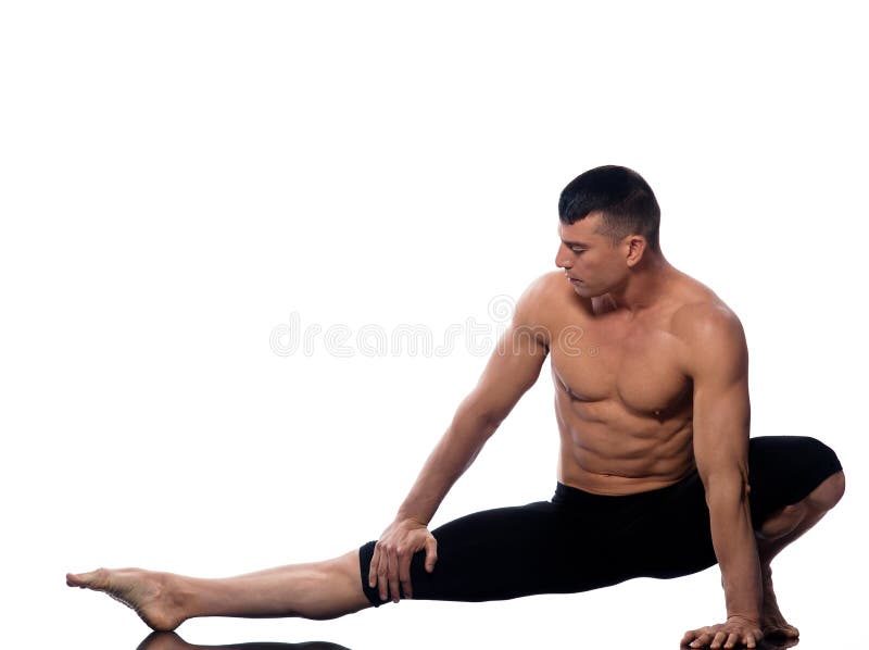 Yoga gimnástica de la postura del hombre que estira foto de archivo libre de regalías Yoga gimnástica de la postura del hombre que estira foto de archivo libre de regalías