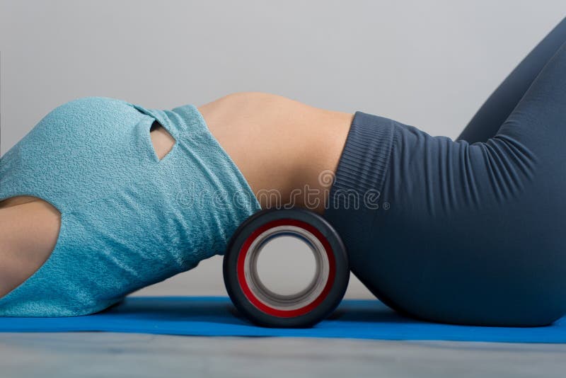 Yoga girl back bend roller wheel