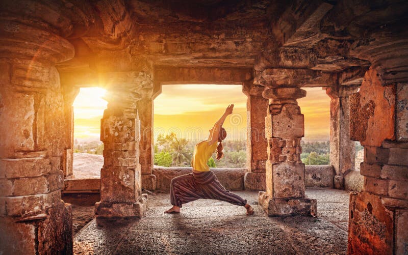 Yoga in Hampi temple stock photo Yoga in Hampi temple stock photo