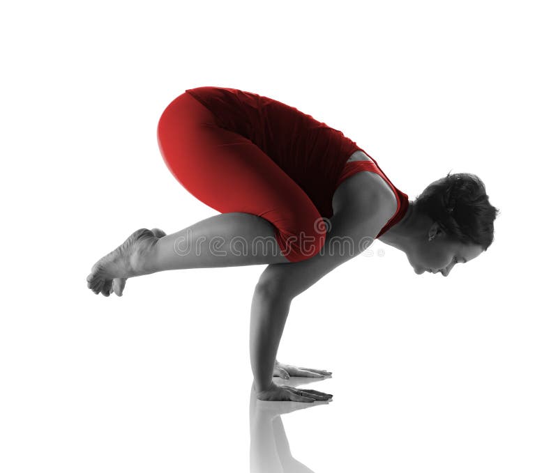 woman making a Yoga pose: Balancing Stick Pose – Tuladandasana