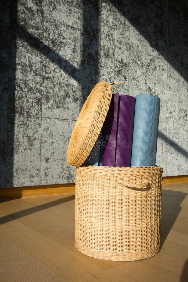 Yoga mat in the basket stock photo. Image of leisure 80380996