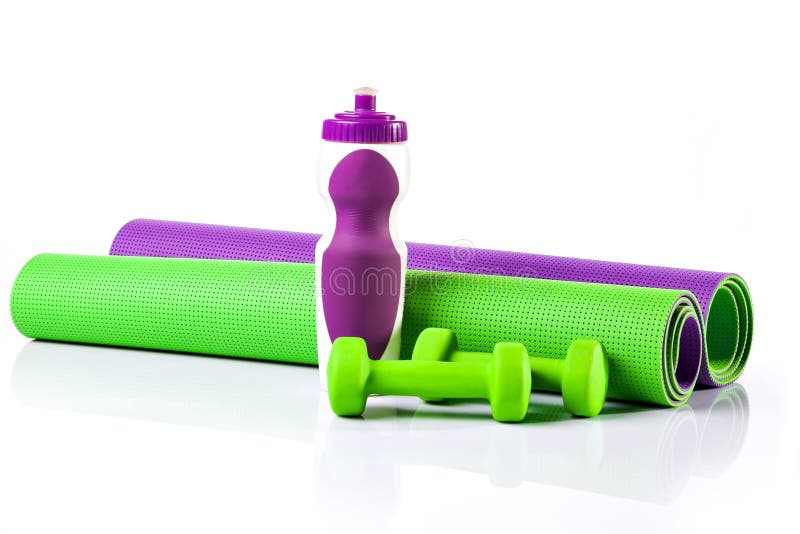 Yoga Mat in a Roll. Mat Workouts. Two Dumbbells. Stock Photo - Image of ...