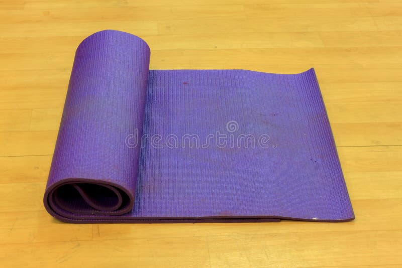 Yoga Mat on Wood Background. Stock Photo Image of floor, display