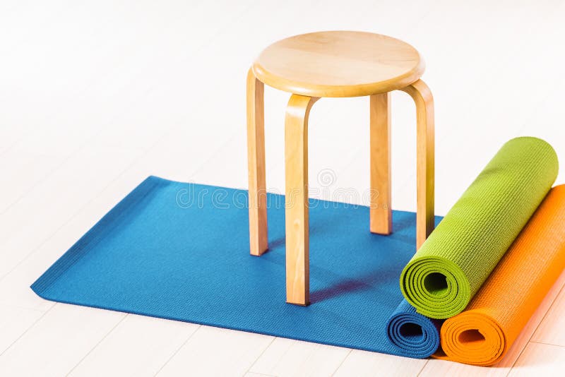 Yoga mats and chairs stock photo. Image of relax, studio 93984930
