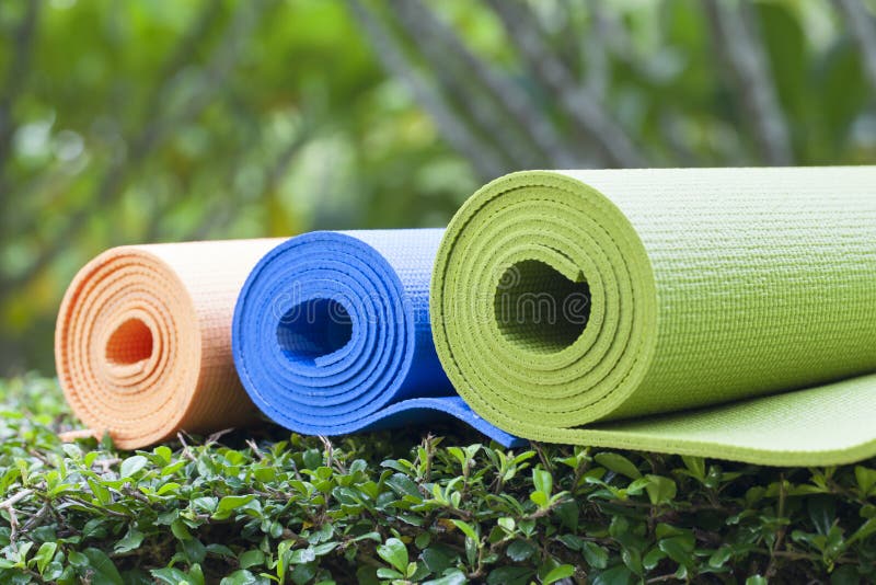 Yoga Mats stock image. Image of orange, exercise, rubber 18230135