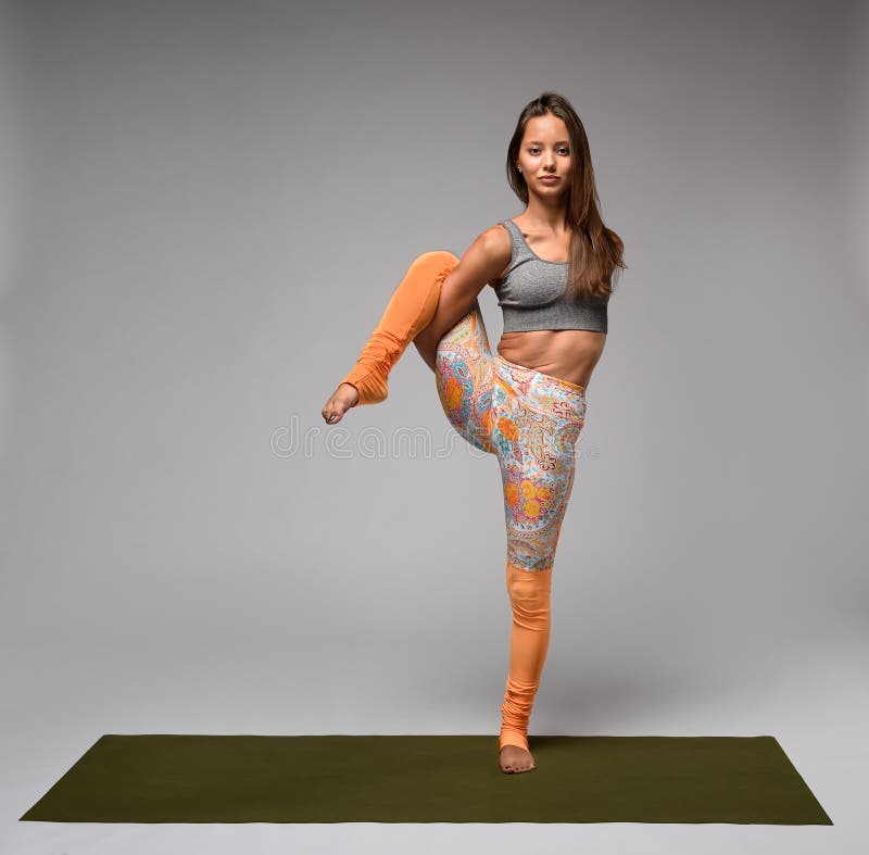 Woman Stand On One Leg In Yoga Pose Stock Image Image of mantal