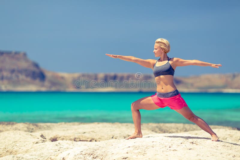 Yoga pose, fit woman exercise on beach