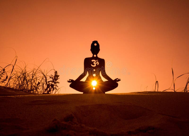 Yoga position silhouette in contrasting sun, Sacral chakra