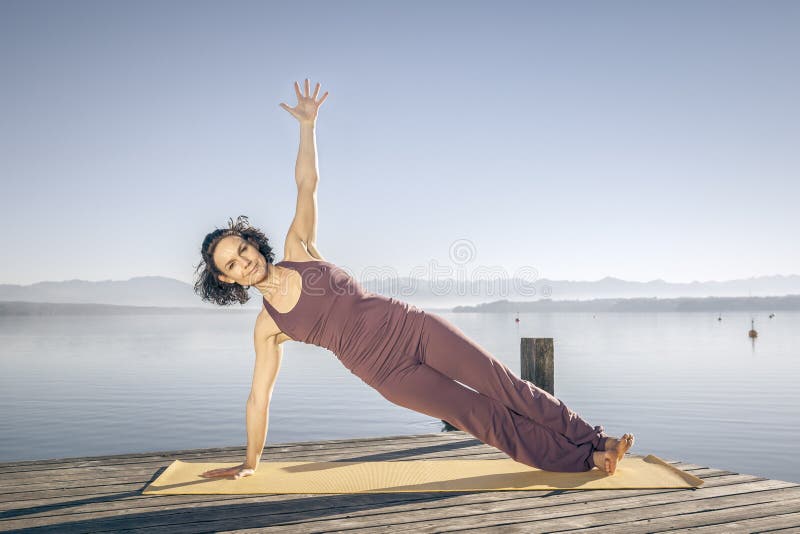 Yoga woman at the lake stock photo. Image of people, asian 68276962