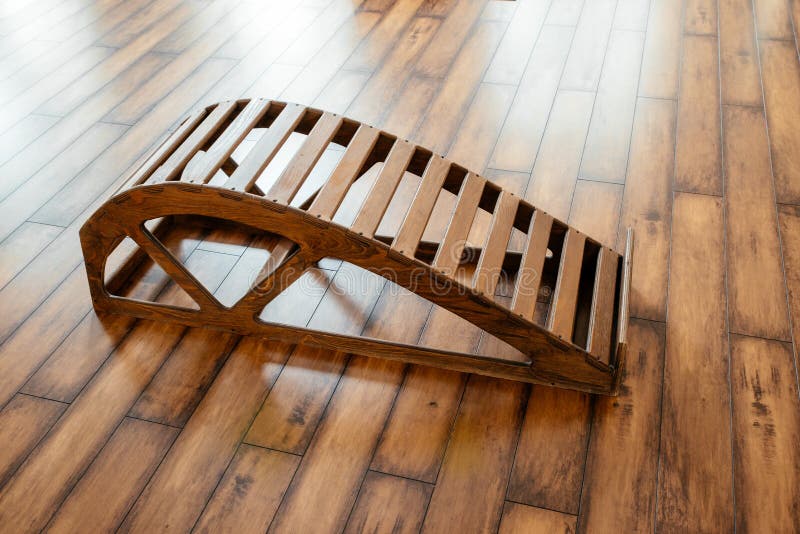 Yoga Wooden Backbend Bench in Studio for Doing Stretching Exercises