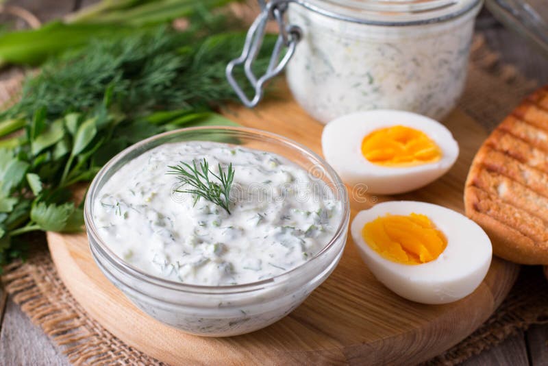 Yoghurt Sauce with Herbs on a Wooden Table Stock Photo Image of
