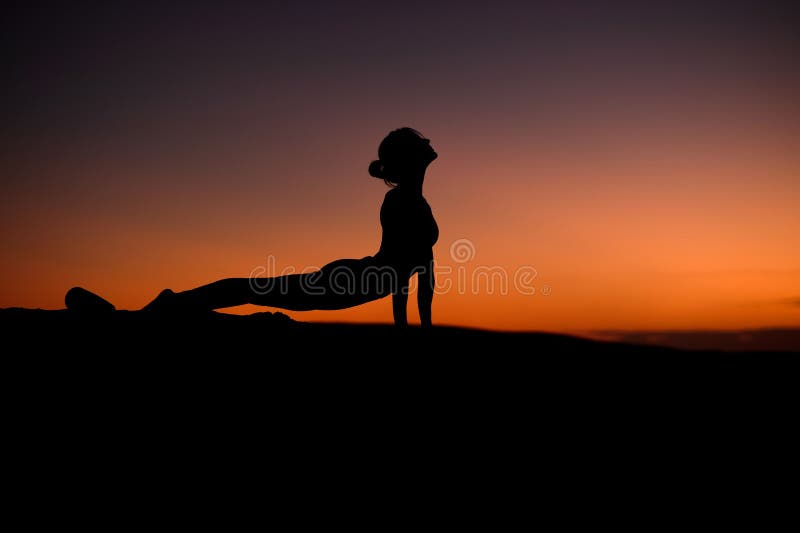 Yogi Master Silhouette on the beach royalty free stock photography