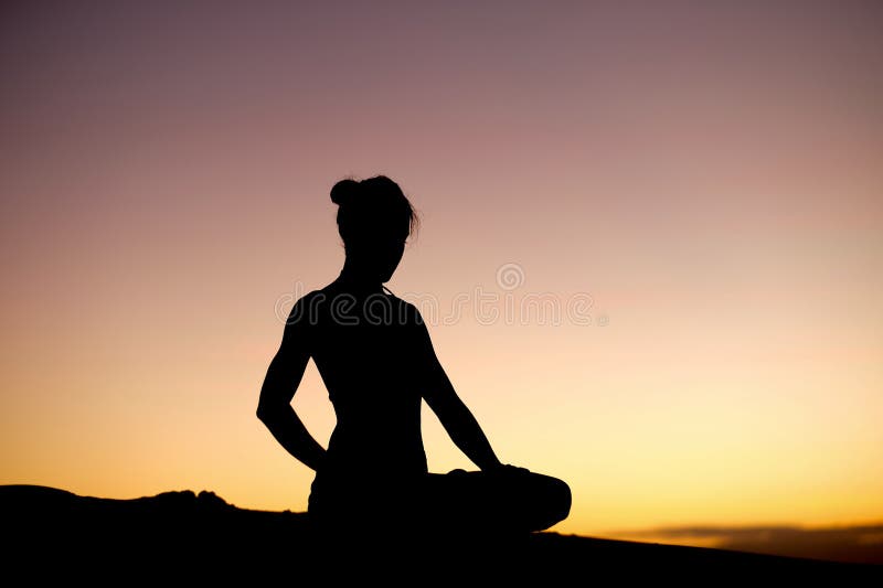 Yogi Master Silhouette on the beach stock image