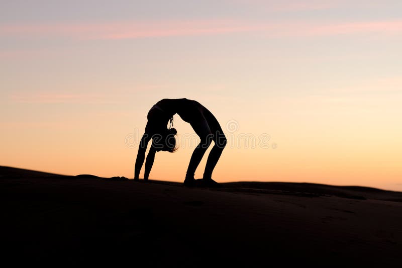 Yogi Master Silhouette on the beach stock photos