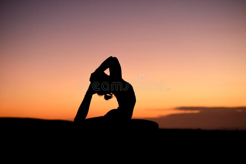 Yogi Master Silhouette on the beach royalty free stock photo