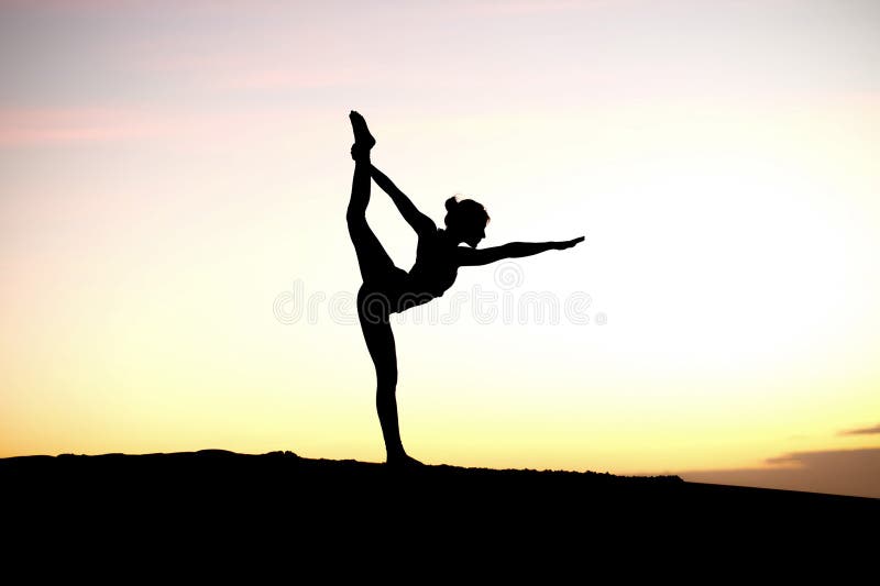 Yogi Master Silhouette on the beach stock images