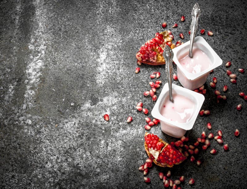 Yogurt with fresh pomegranate.