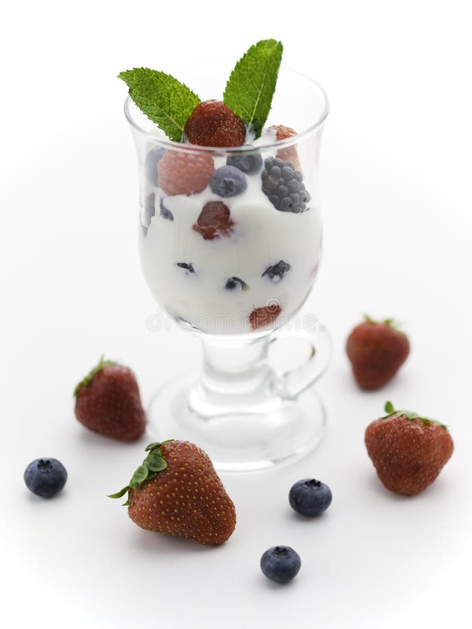 Yogurt and fruit on white stock photo. Image of cream - 10887688