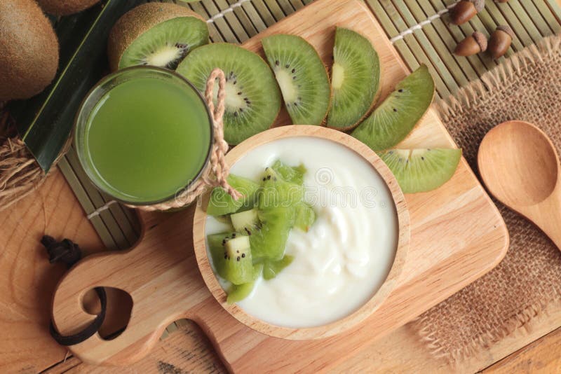 Yogurt White with Green Kiwi Fruit and Kiwi Juice. Stock Image Image