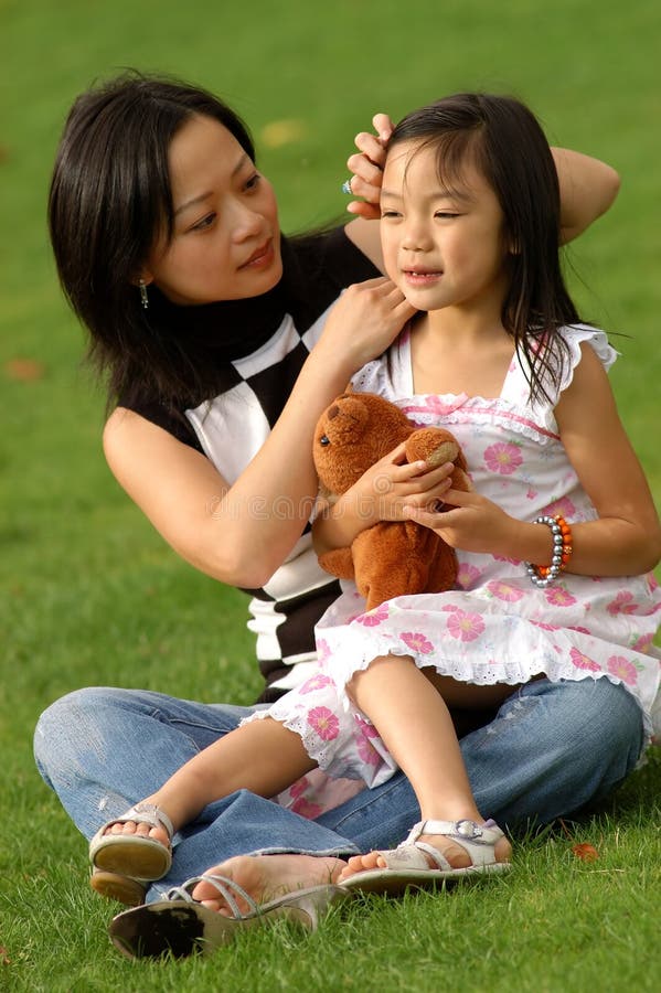 Yong woman and her daughter no.3 stock image