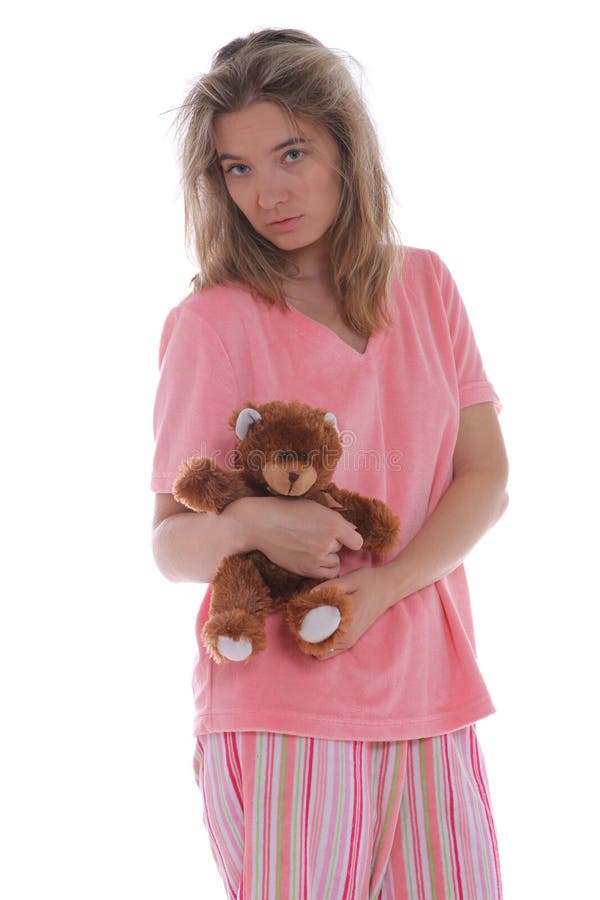 Yonge woman holding a cute teddy bear