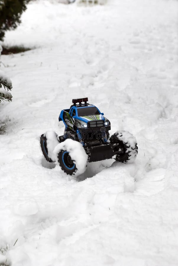 RC model in deep fresh snow stock photo