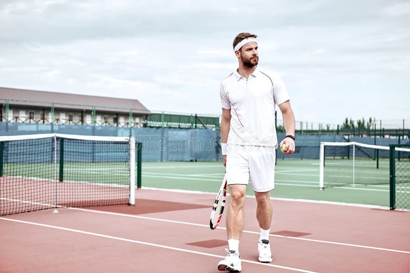 You Can T Win Unless You Learn How To Lose Handsome Man Standing On The Tennis Court With The Racket And The Ball In Stock Image Image Of Hobby Male