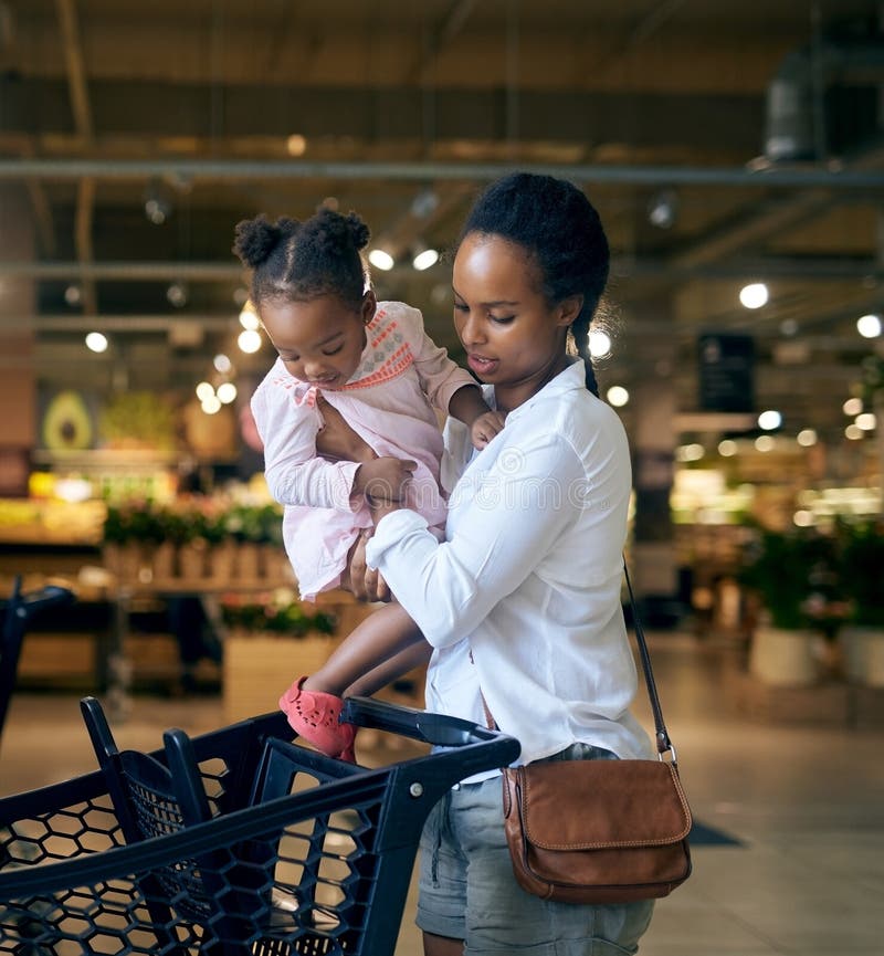 You Sit Right There. a Young Mother Doing Grocery Shopping with Her ...