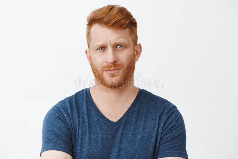 You talking bullshit, doubt can trust you. Unsure displeased redhead mature male entrepreneur looking suspiciously at