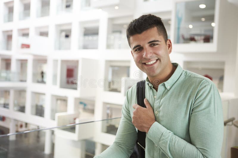 Young adult Middle Eastern male student smiling to camera stock photo Young adult Middle Eastern male student smiling to camera stock photo